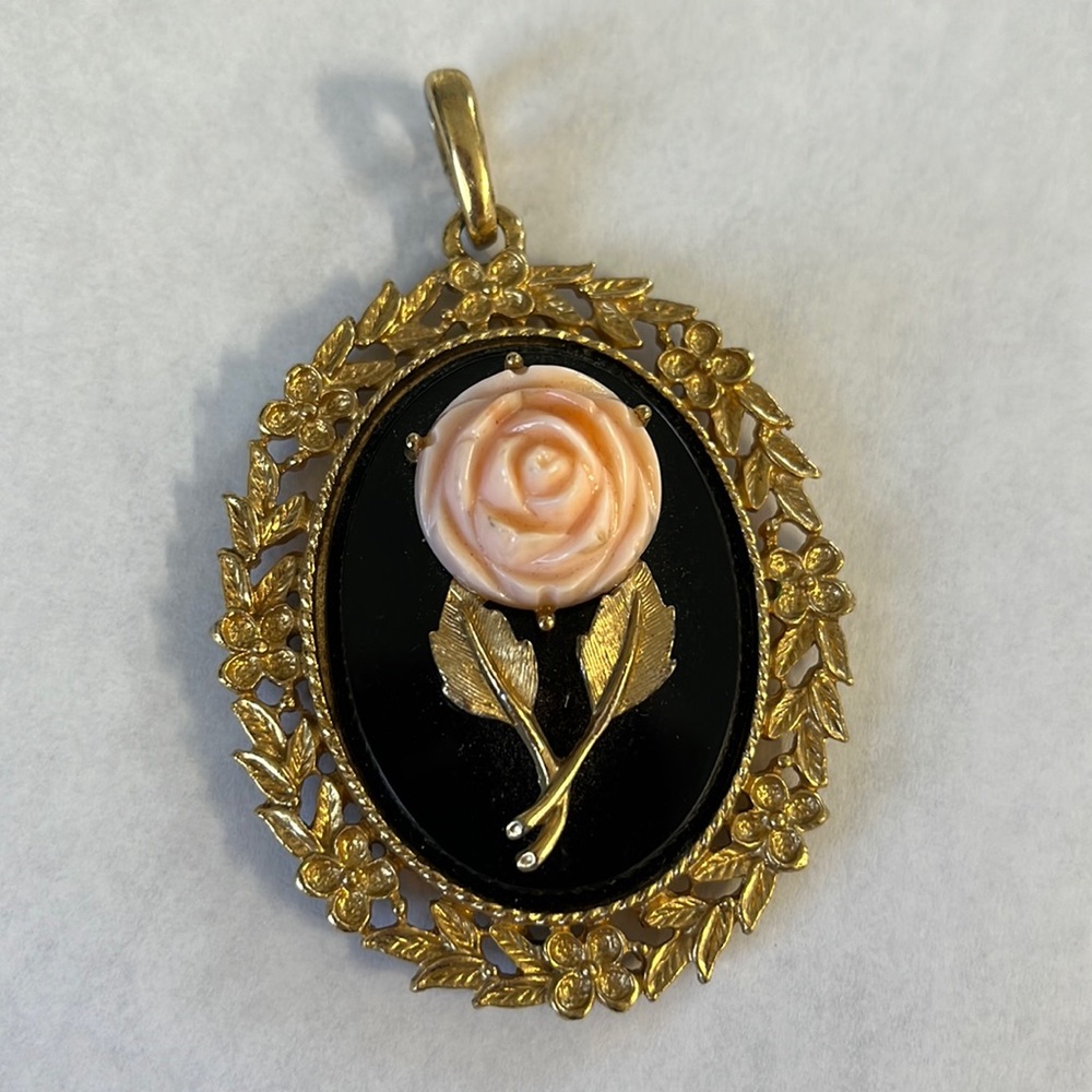 Avon vintage reversible pendent gold plated with pink rose and mirror .
